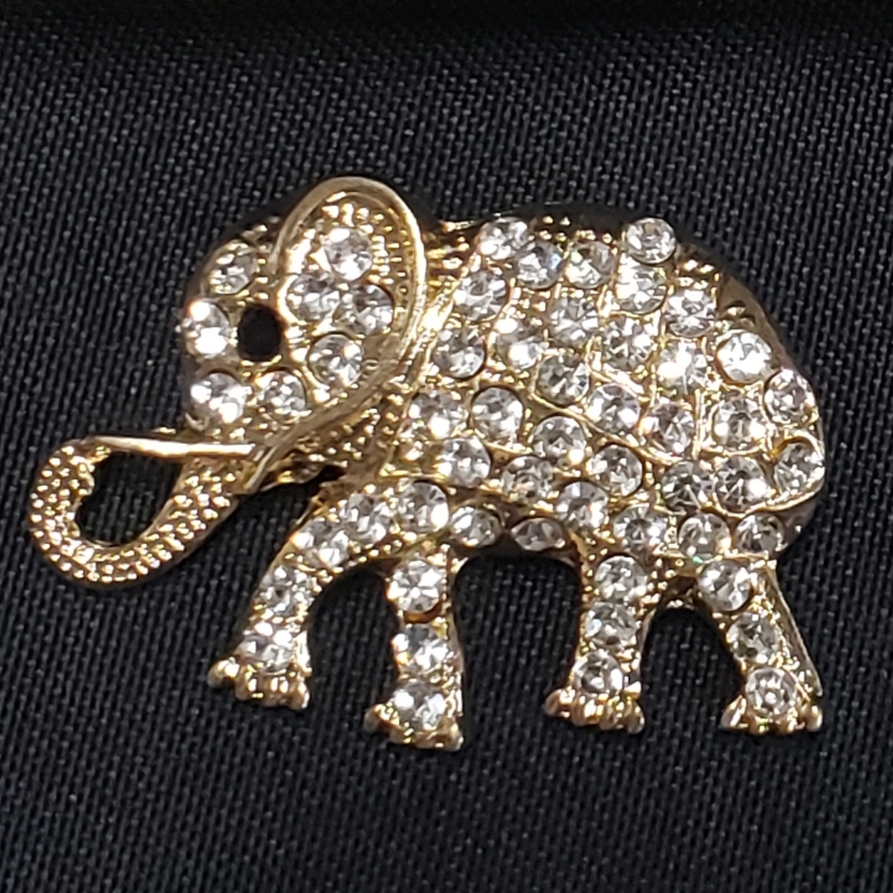 Elegant Gold and Silver Elephant Brooch